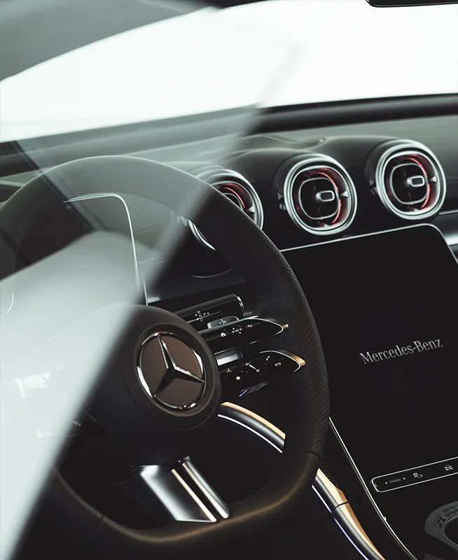 Interni Mercedes-Benz con volante, display digitale e illuminazione ambientale